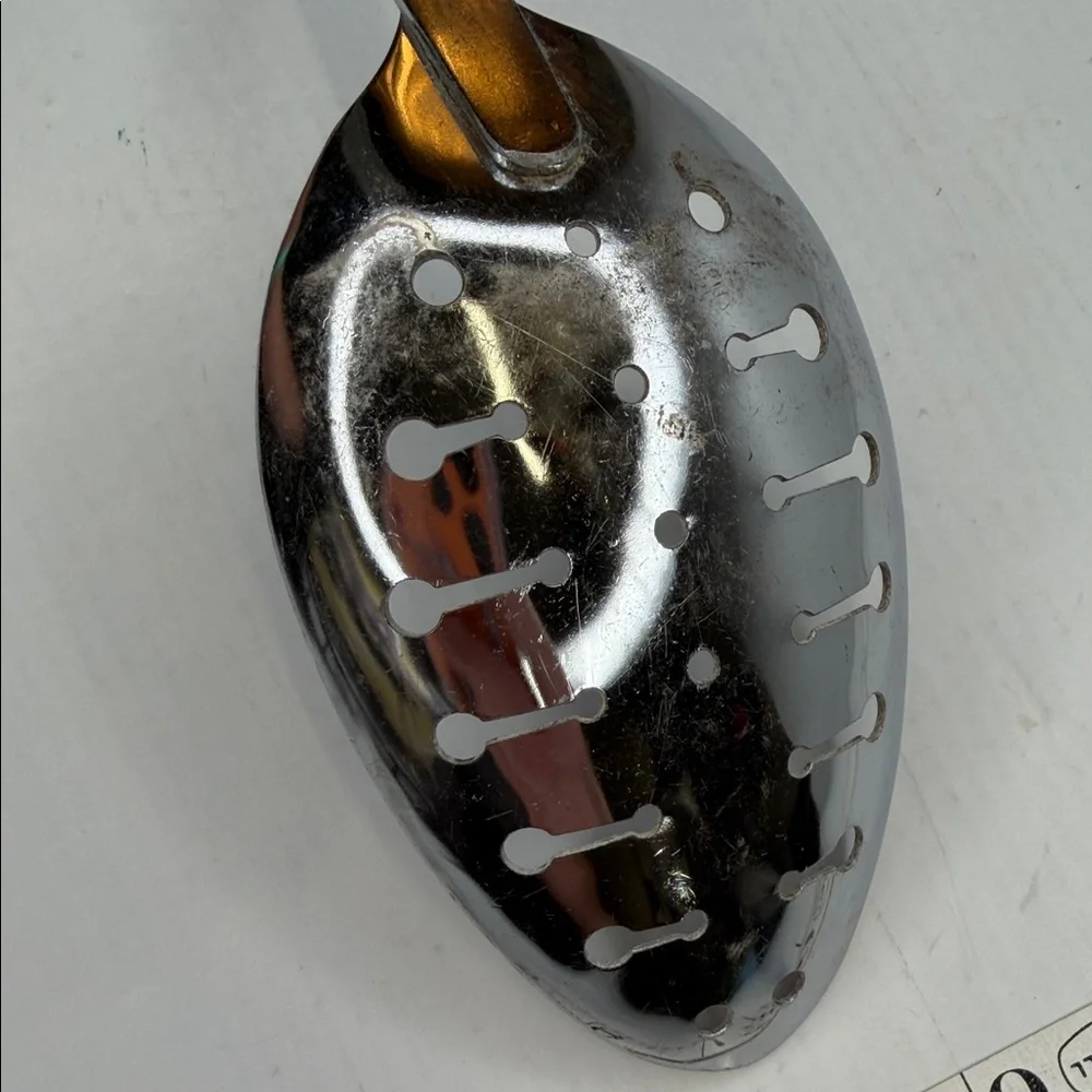 Vintage EKCO Chromium Plated Slotted Spoon with Cream Handle